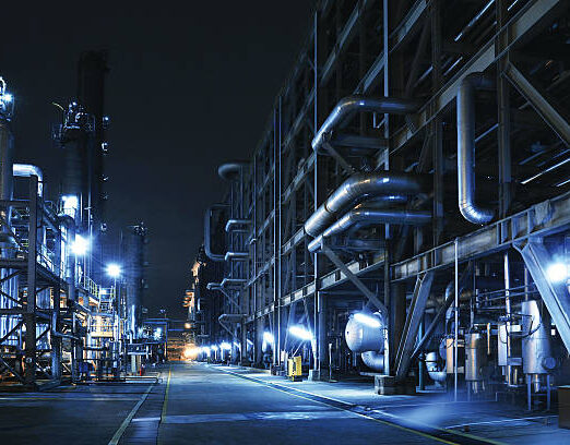Oil Refinery, Chemical & Petrochemical plant abstract at night.